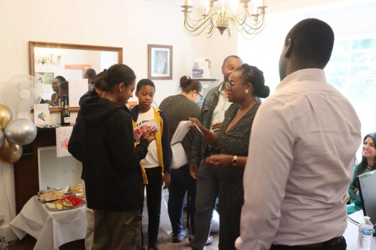 A celebration featuring both children and adults sharing moments together.